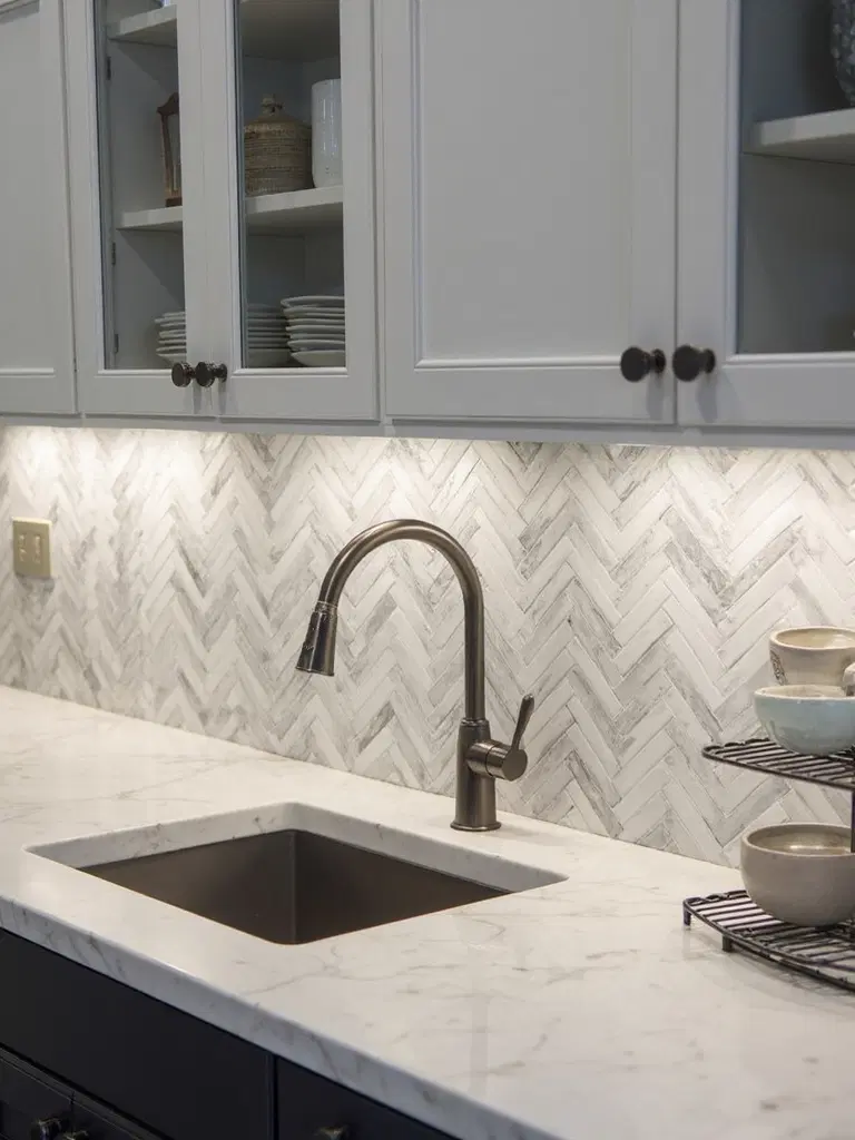herringbone mosaic backsplash