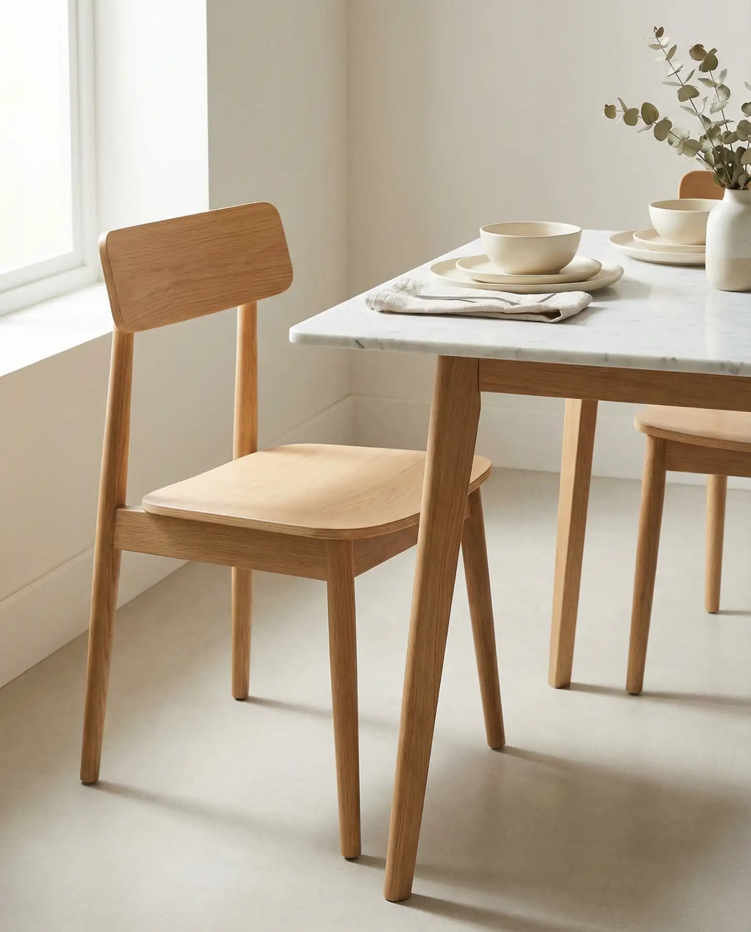 Minimalist Chairs with Streamlined Silhouettes 2