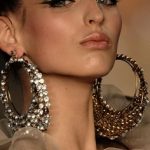 big earrings. love the winged eyeliner and those gorgeous earrings. XXOQTPD