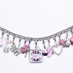 bracelets with charms this silver glitzy pink frosted cupcake hangs about 3/4 CRDLYBH