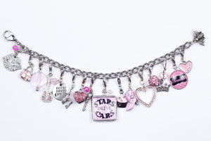 bracelets with charms this silver glitzy pink frosted cupcake hangs about 3/4 CRDLYBH