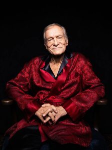 hugh hefner portrayed in the media by esquire in a smoking jacket OOZMEDJ