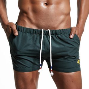 superbody summer menu0027s sport running beach shorts casual solid color  elastic surf gym NQWSJZG