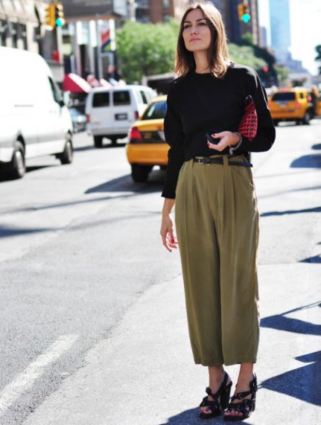 Green cropped khaki wide leg suit pants with a black sweater