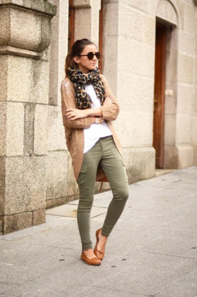 Brown cardigan with leopard print scarf and green and khaki skinny suit pants