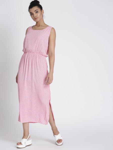 pale pink sleeveless maxi dress with gathered waist and white sandals