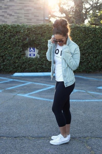 blue denim jacket with white t-shirt and black cropped tight running pants
