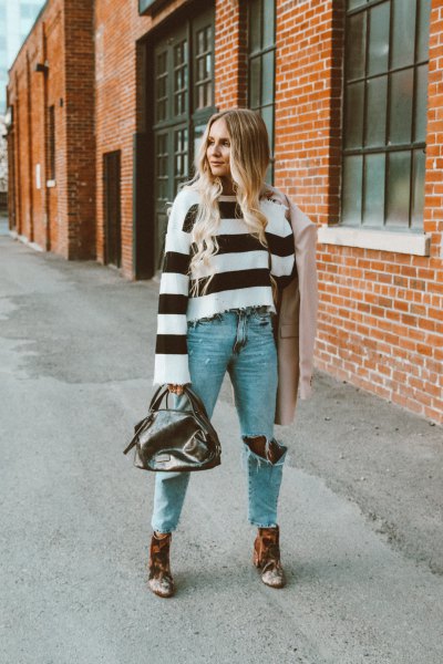 Black and white wide striped sweater with ankle boots