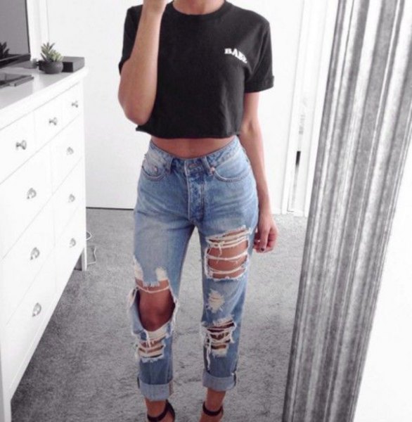 Black cropped t-shirt with distressed blue mom jeans