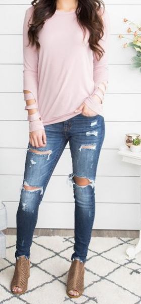 light pink long sleeve t-shirt with dark blue ripped jeans and open toe boots