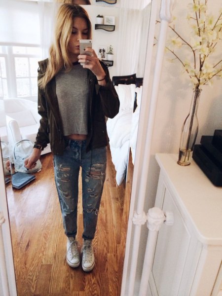 Gray cropped t-shirt with black leather jacket and ripped cuffed jeans