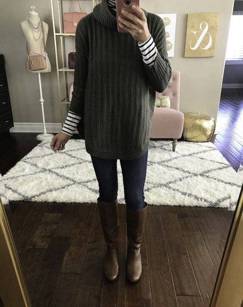 Green ribbed turtleneck sweater paired with black and white striped long sleeve t-shirt