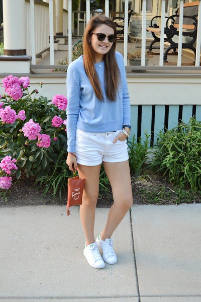 Sky blue sweater with mini white jean shorts and sneakers