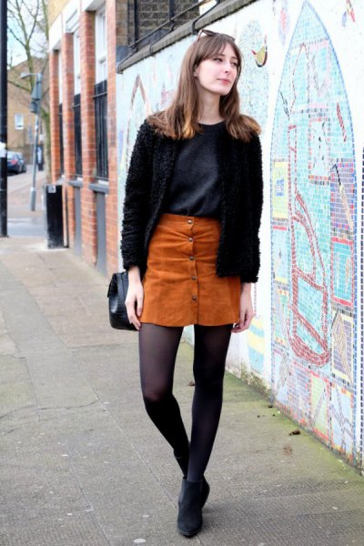 Black fluffy cardigan with buttoned suede mini skirt
