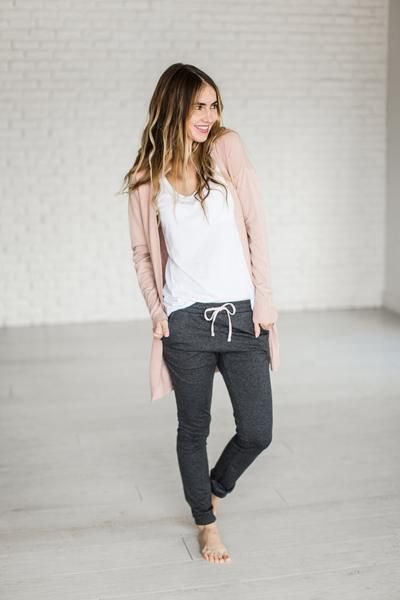 tan cardigan with white tank top and gray sweatpants