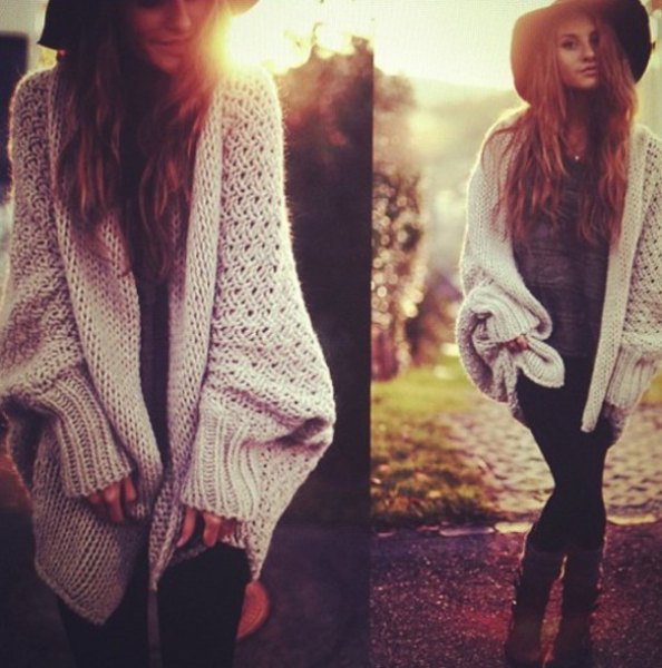 white, thick sweater cardigan with a black slouch cap