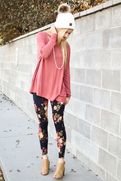 Rouge pink t-shirt with floral printed patterned leggings and open toe boots