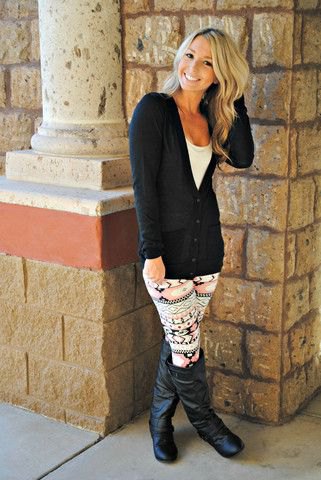 Black cardigan with leggings and knee high leather boots