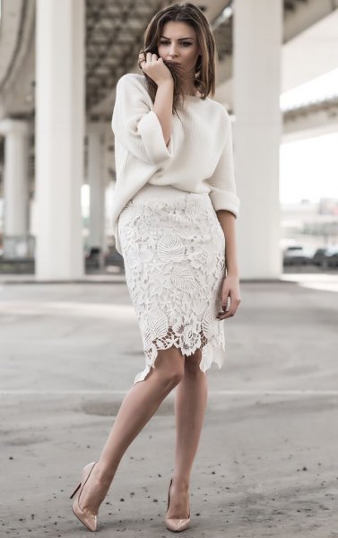 White, thick sweater with a knee-length lace skirt