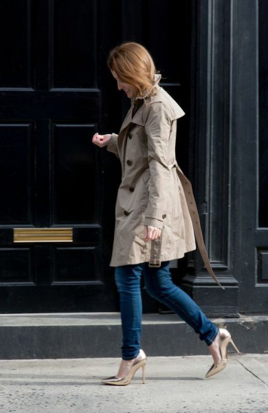 grey, long parka jacket with dark skinny jeans and golden heels