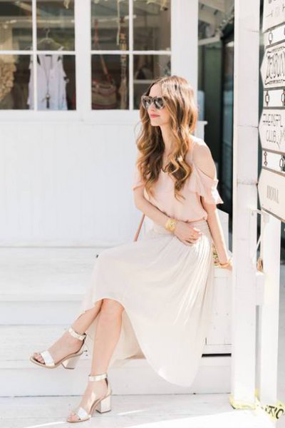 pale pink chiffon blouse with white pleated maxi skirt and gold open toe heels