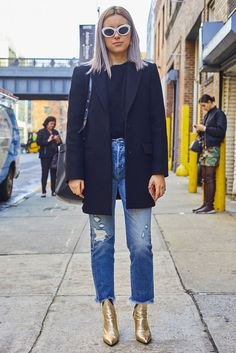 black wool coat with ripped ankle jeans