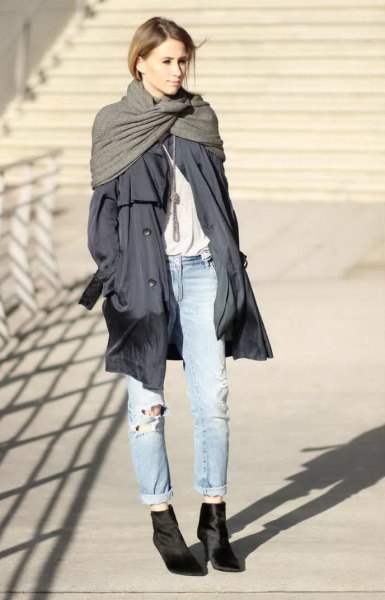 gray, long parka jacket with light blue boyfriend jeans with cuffs