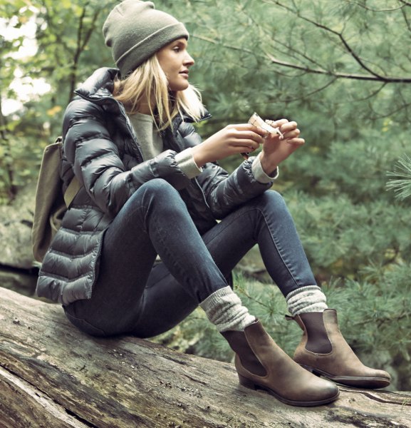 gray down jacket with skinny jeans and camel hiking boots