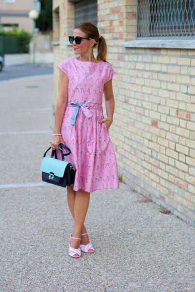 Light blue sheath midi dress with tie belt, cap sleeves and matching sandals