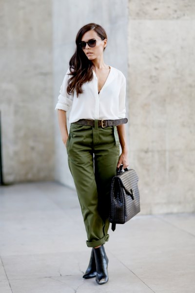White button down chiffon blouse, green belt pants and leather Chelsea boots