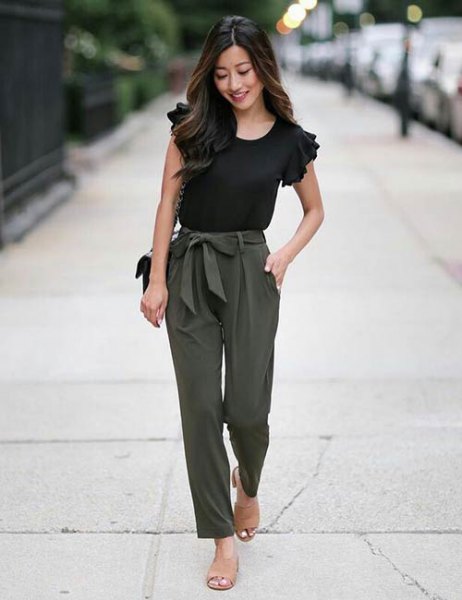 Black ruffle sleeve t-shirt and army green tie front slim fit
pants