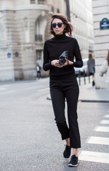 Black turtleneck sweater with cropped slim fit jeans and hiking boots