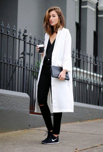 White maxi blazer with V-neck top and black hiking boots