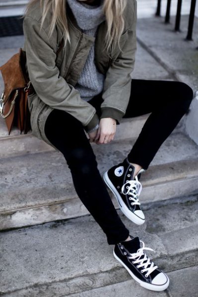 gray parka jacket with turtleneck and black and white high-top plimsolls