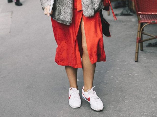 Red midi shirt dress with a high slit and white walking
sneakers