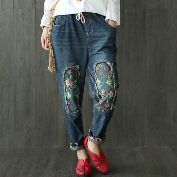 White blouse with dark blue embroidered fleece lined jeans