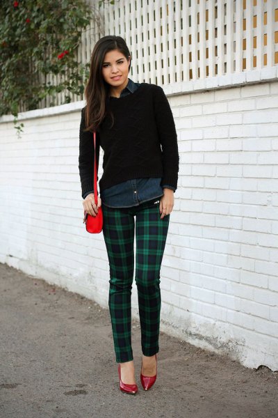 Black button down shirt and dark blue and green checked trousers