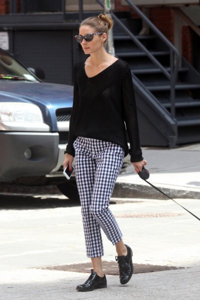 Black comfortable V-neck sweater and plaid pants