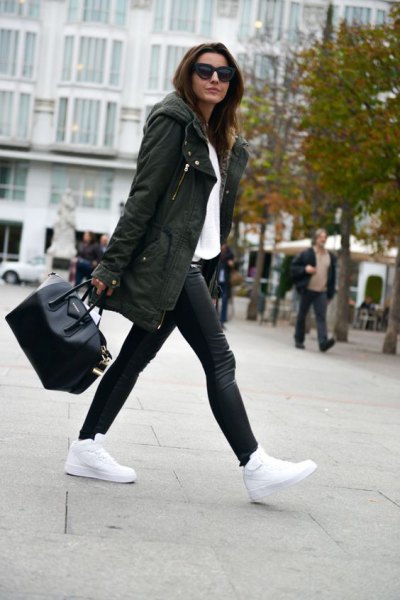 Long hooded parka jacket, white blouse and leather leggings