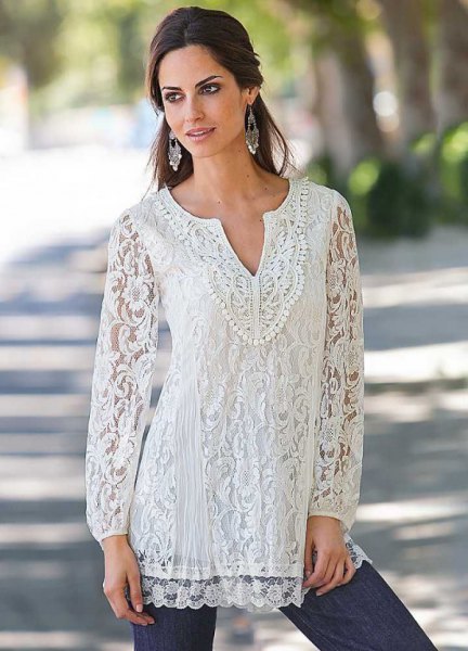 White lace blouse with dark blue skinny jeans