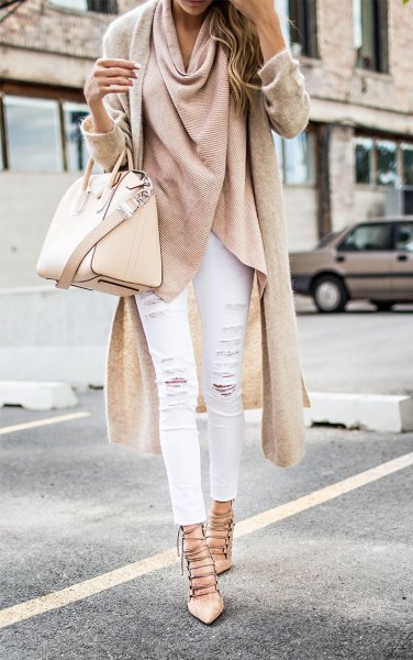Long pink wool wrap cardigan with white ripped jeans and strappy heeled sandals