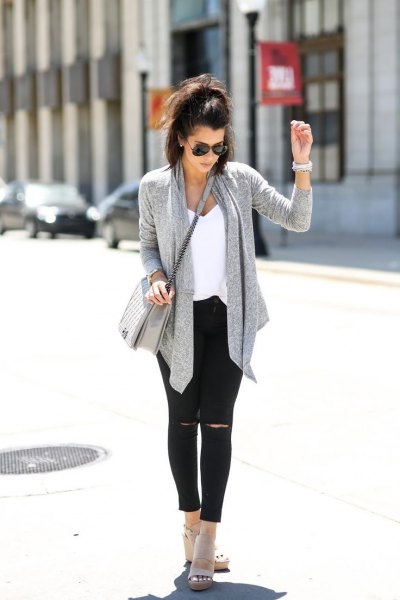 Gray sweater cardigan with black ankle jeans and open suede boots