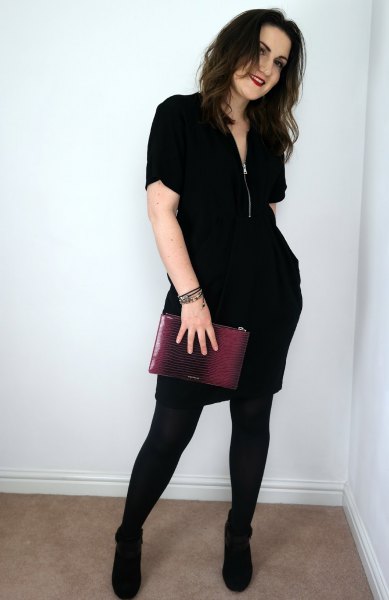 Black zip-up mini dress, leggings and boots