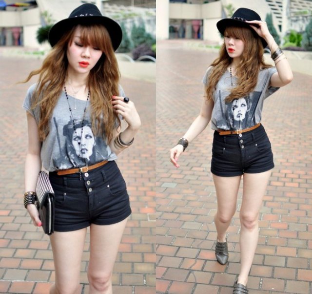 Gray graphic tee with black button front shorts