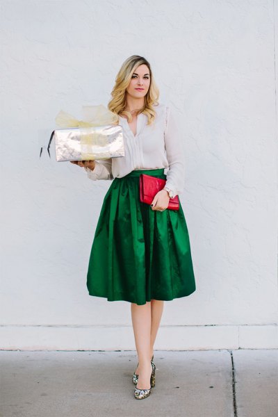 Slim-fit blouse with a flared midi skirt in green silk