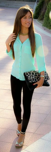 Mint green slim fit button down shirt with leopard print clutch