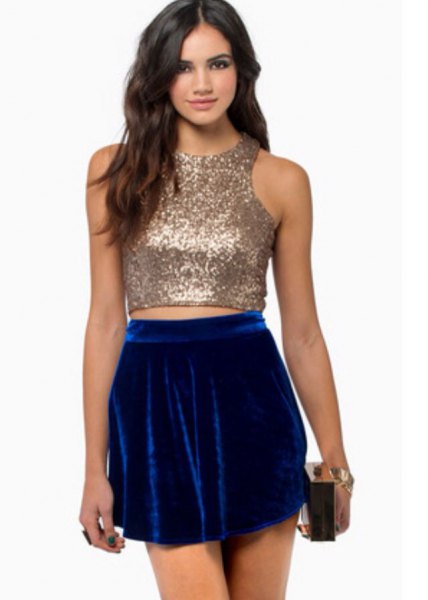 Rose gold glitter crop top with blue velvet mini skirt