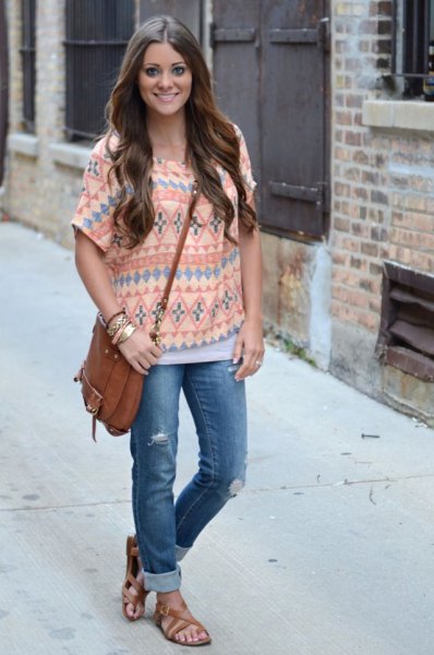 Light yellow tribal top and blue cuffed jeans