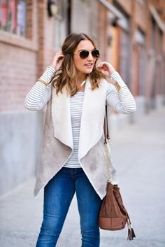 Gray and white sherpa vest with striped long sleeve tee