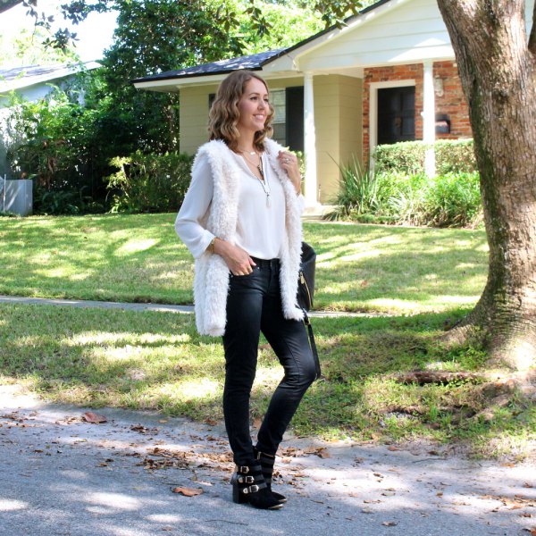 White fluffy longline vest with chiffon blouse and skinny jeans